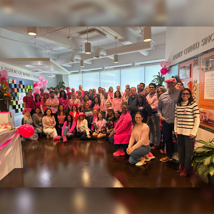 Ruiz Foods employees wear pink for a 